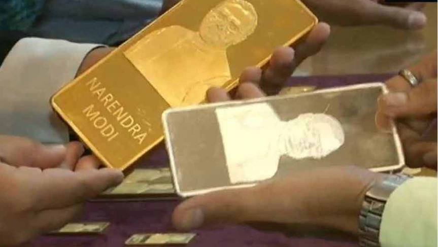 மோடியின் உருவம் பொறித்த தங்கக் கட்டிகள் விற்பனை